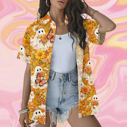 Two people wearing matching family hawaiian shirts with ghost and floral prints