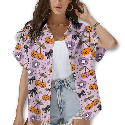 Lifestyle view of a family wearing matching Halloween Hawaiian shirts