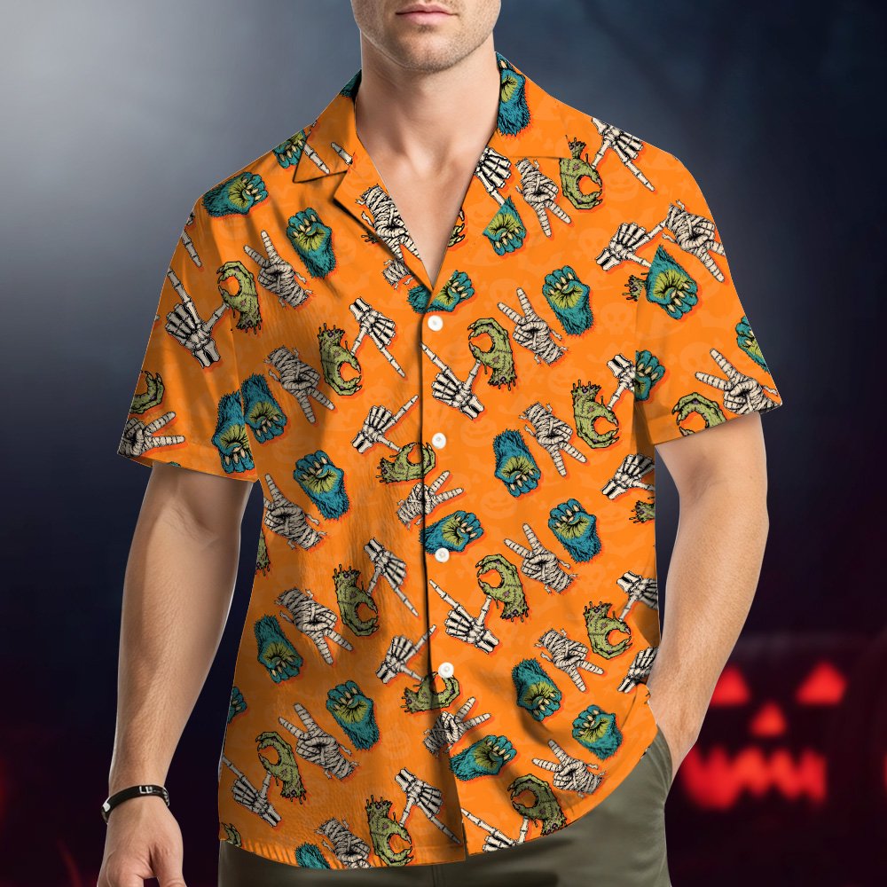 Lifestyle view of an adult wearing the Halloween monster hands Hawaiian shirt