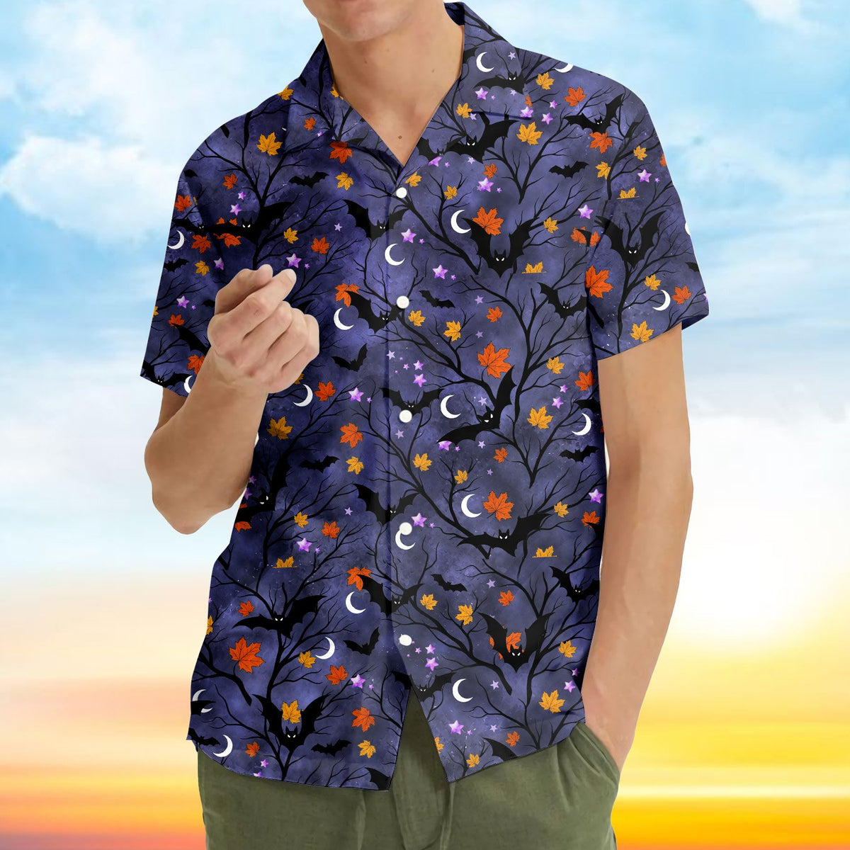 Matching family halloween hawaiian shirt featuring bats, moons, and bare trees on a purple background, front view close-up