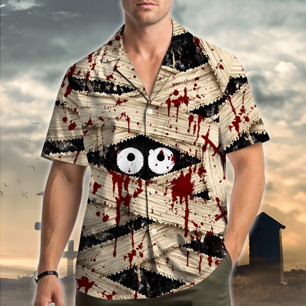 Lifestyle view of a person wearing the mummy halloween hawaiian shirt
