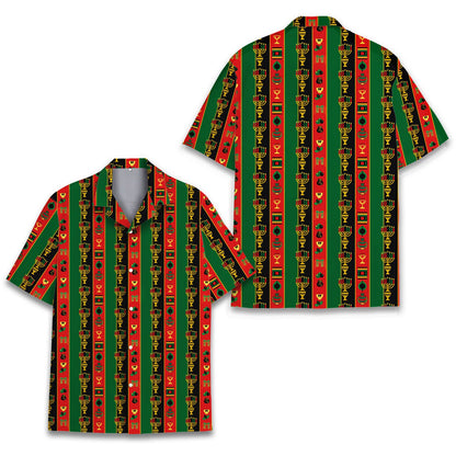 Matching family green Kwanzaa Hawaiian shirt featuring stripes and kinara on a flat lay