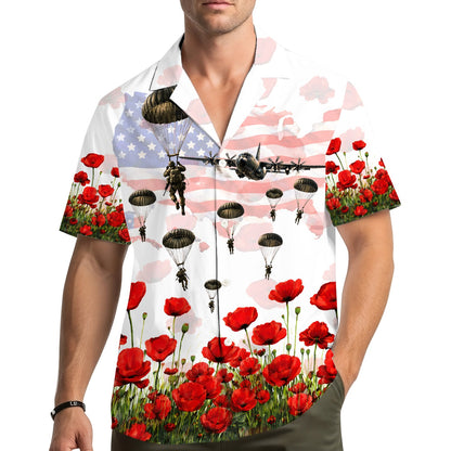 Adult wearing the white military hawaiian shirt outdoors
