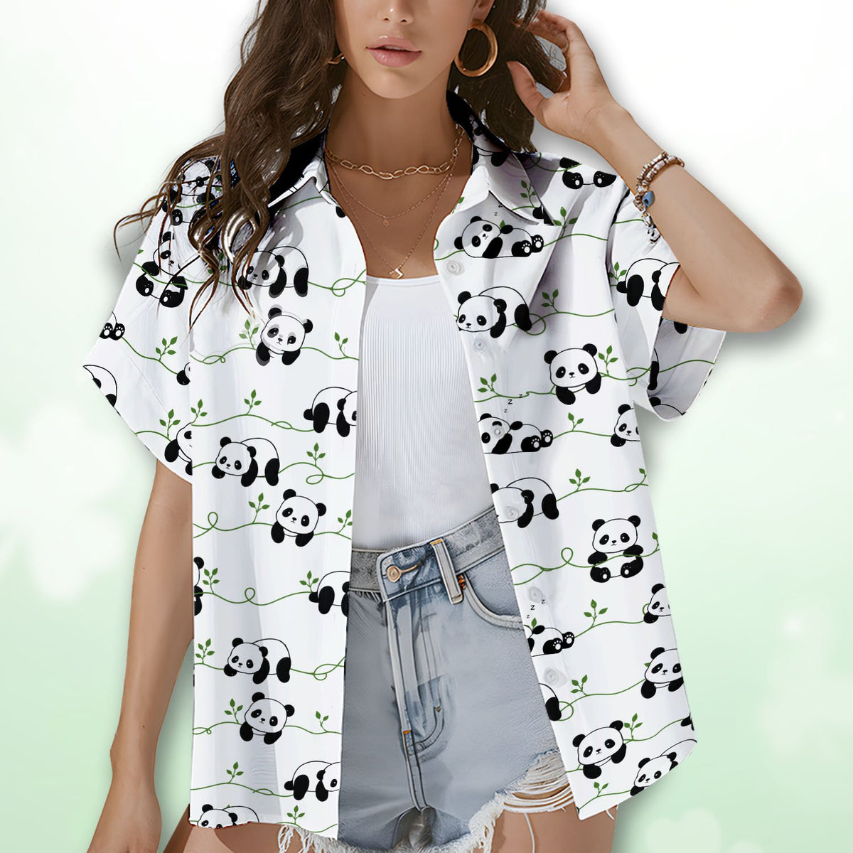 Person wearing matching family hawaiian shirts with panda design, lifestyle view 3