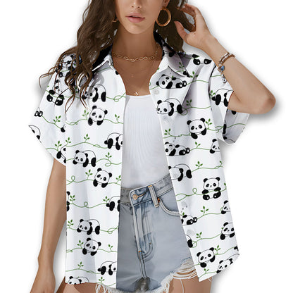 Person wearing matching family hawaiian shirts with panda design, lifestyle view 1