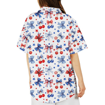 Family wearing matching patriotic hawaiian shirts with bows and cherries, outdoor lifestyle view