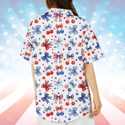 Family wearing matching patriotic hawaiian shirts with bows and cherries, close-up lifestyle view