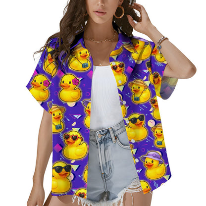 Person wearing the purple geometric duck matching family Hawaiian shirt outdoors
