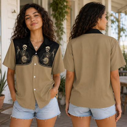 Lifestyle view of the beige skeletons hawaiian shirt with banjo playing skeletons design worn by a model