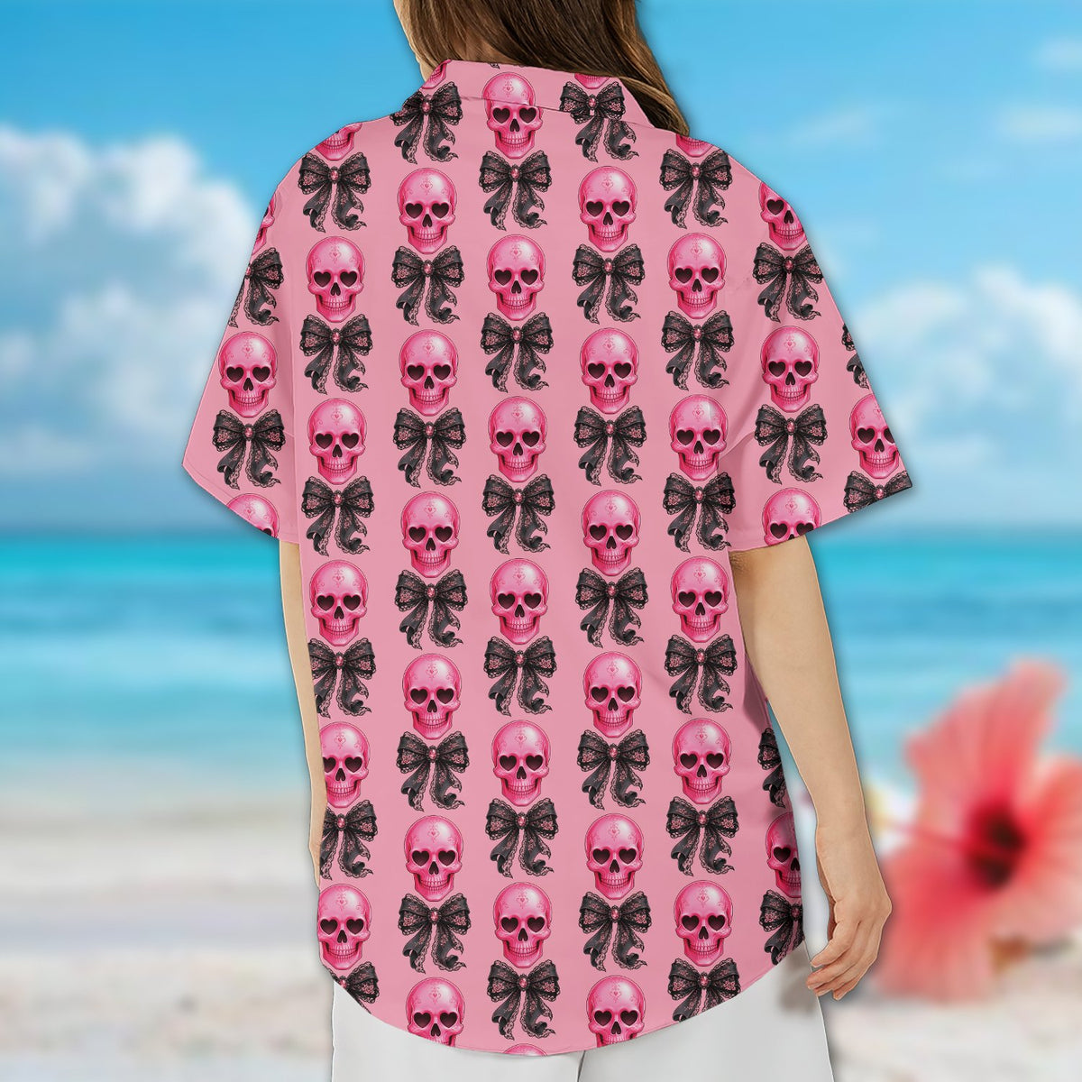 Family wearing matching pink skulls hawaiian shirts, lifestyle view 1