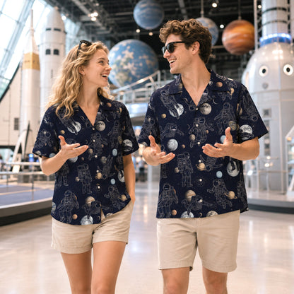 Lifestyle shot showing people wearing matching family hawaiian shirts with a space theme