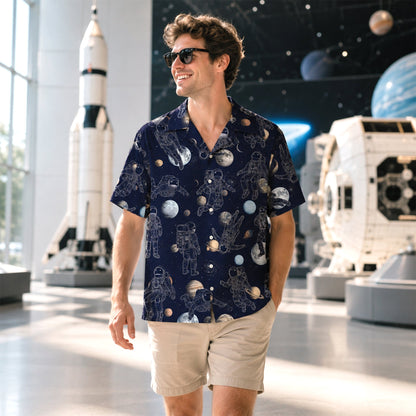 Close up of a person wearing the astronaut print space hawaiian shirt outdoors