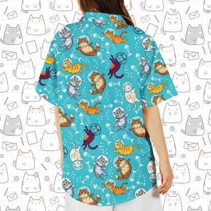 Light blue space hawaiian shirt with cartoon cats in helmets, back folded view