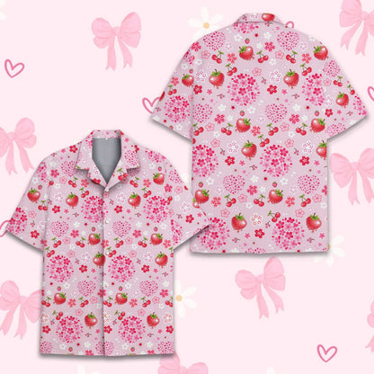 Detailed view of the strawberry and cherry blossom pattern on the hawaiian shirt