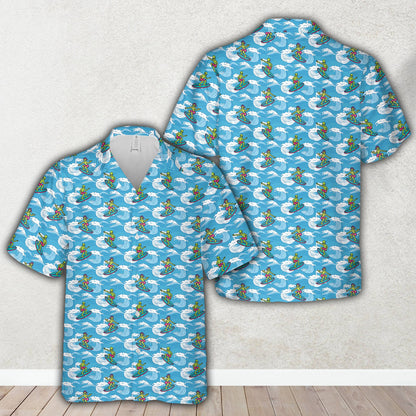 Detailed view of the surfing alien print on the hawaiian shirt