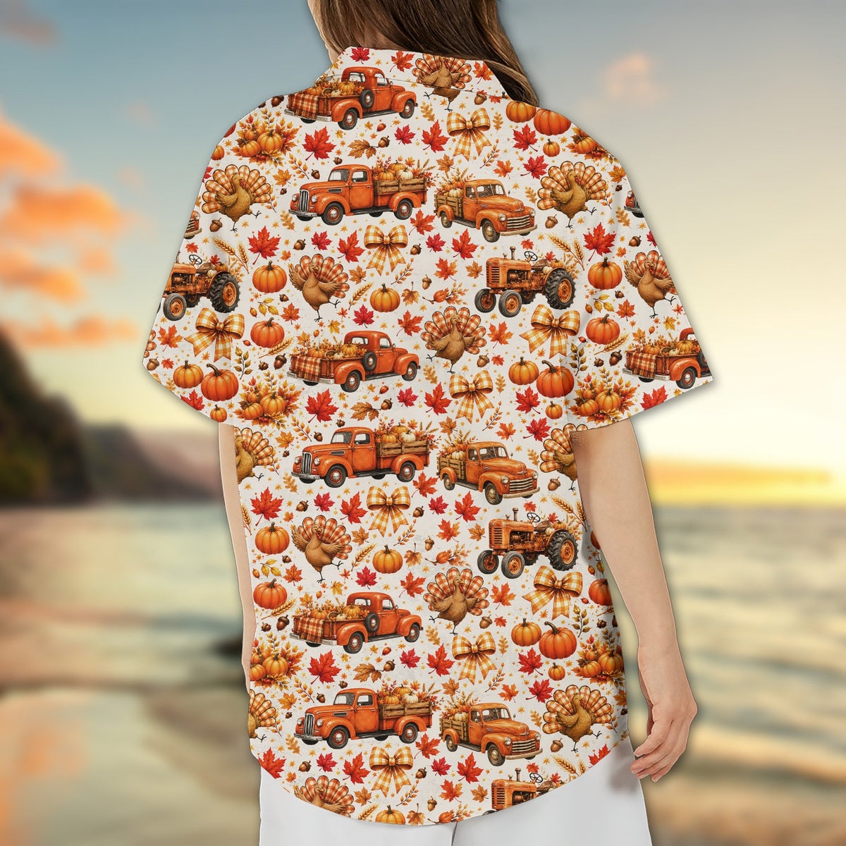 Detailed back view of the white Thanksgiving Hawaiian shirt showing trucks and pumpkins