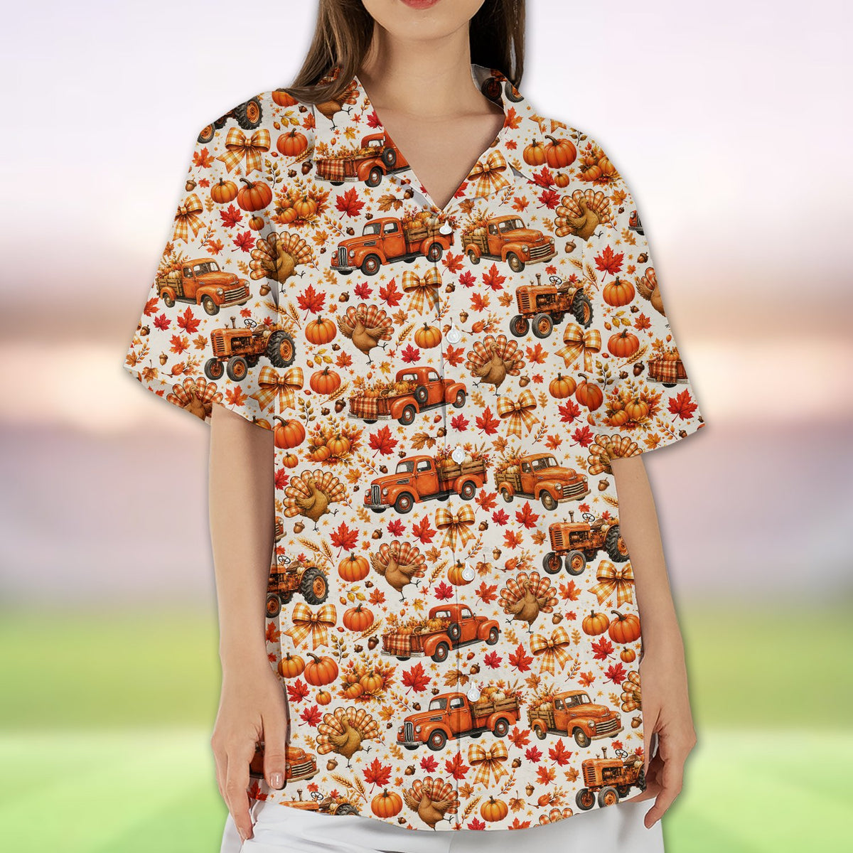 Lifestyle shot highlighting the autumn pattern on the white Thanksgiving Hawaiian shirt