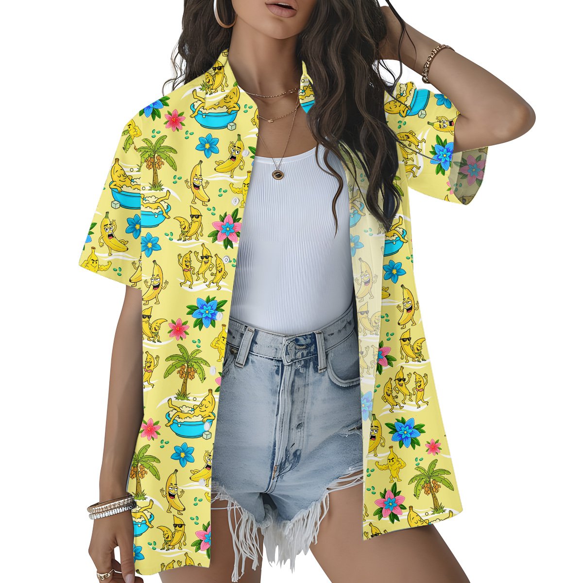 Close up front view of the yellow tropical hawaiian shirt showing palm trees and flowers