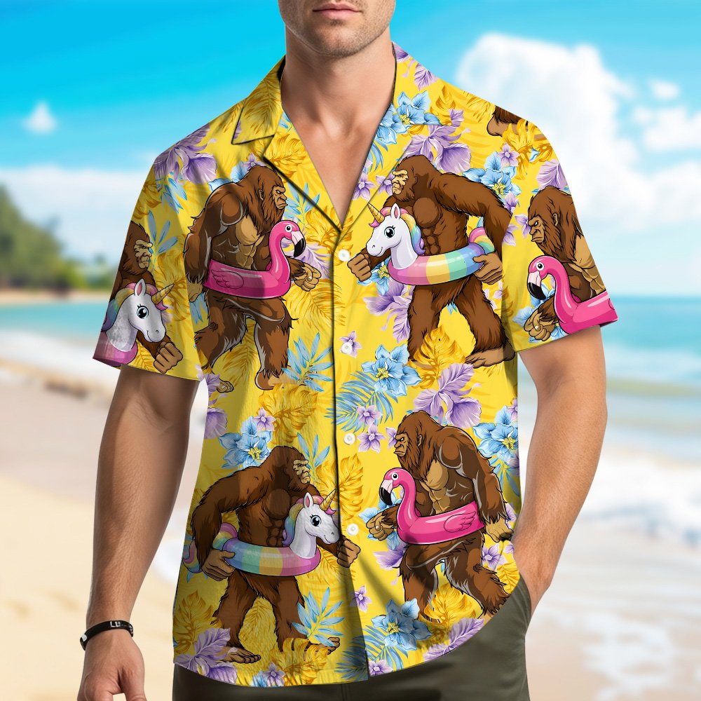 Front view of the tropical bigfoot hawaiian shirt with flamingo and unicorn pool floats