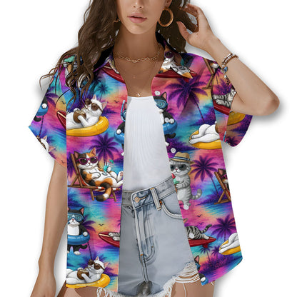 Person wearing matching family hawaiian shirts featuring a tropical cats pattern, lifestyle view 1