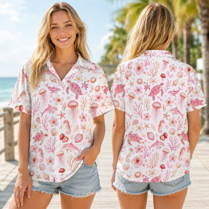 Lifestyle view of someone wearing the matching family hawaiian shirt with pink coastal elements outdoors