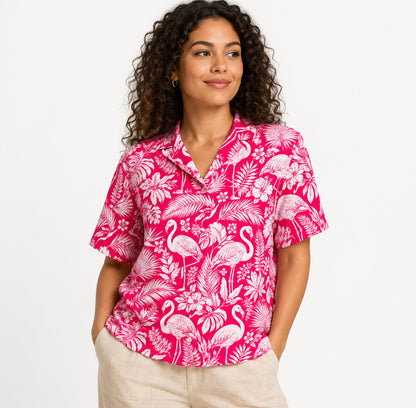Lifestyle view of matching family hawaiian shirts in tropical flamingo design