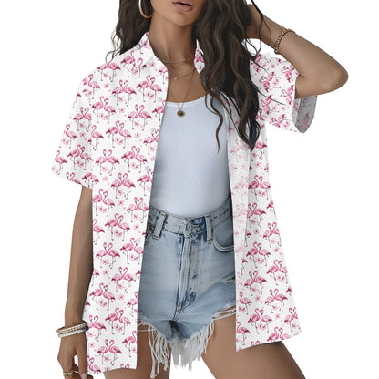 Lifestyle view of an adult wearing the tropical flamingo hawaiian shirt outdoors