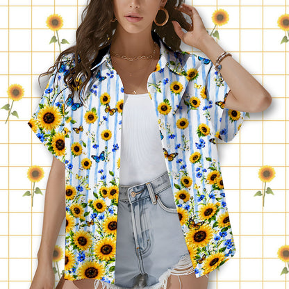 Lifestyle view showing the intricate sunflower and butterfly details of the hawaiian shirt