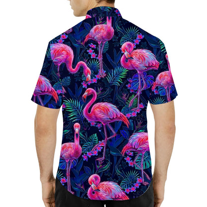 Close-up lifestyle view of the vibrant pink flamingo pattern on the hawaiian shirt
