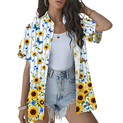 Lifestyle view of the tropical floral hawaiian shirt worn in a bright summer setting
