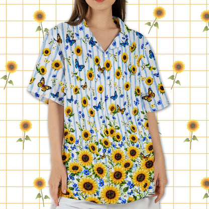 Lifestyle view focusing on the bottom hem sunflower clusters of the hawaiian shirt