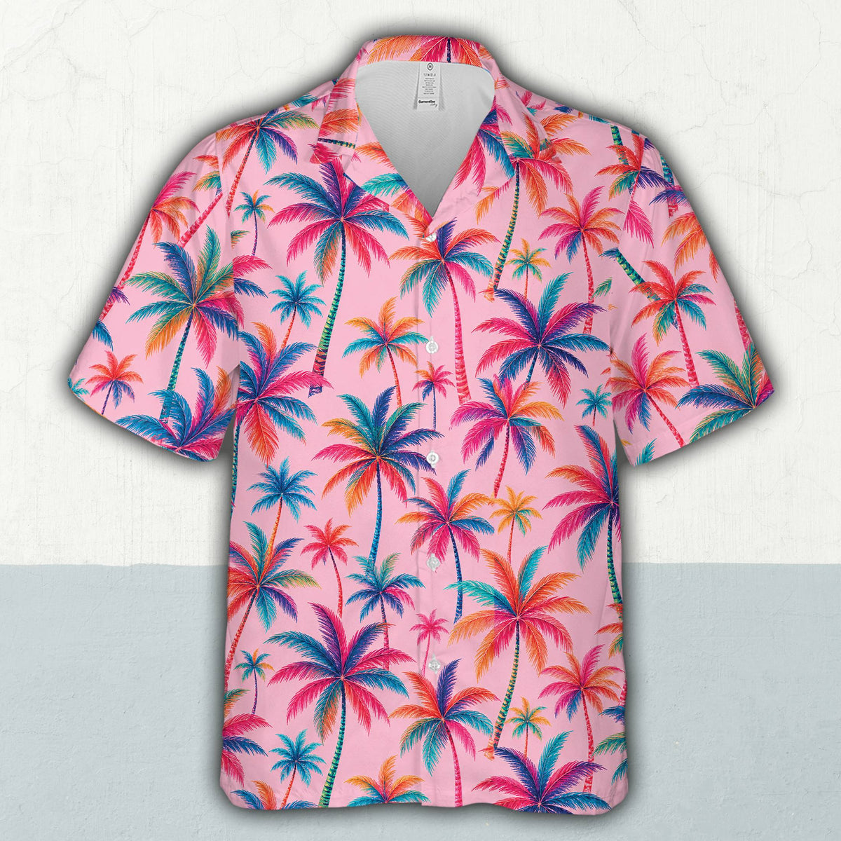 Front view of the pink tropical hawaiian shirt with vibrant palm tree pattern