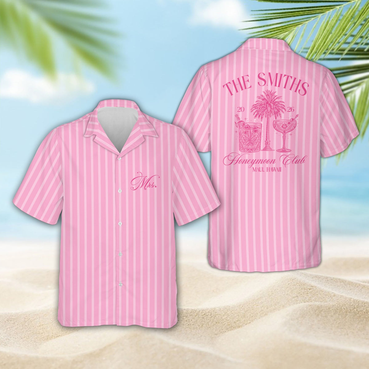 Two people wearing matching pastel tropical honeymoon hawaiian shirts