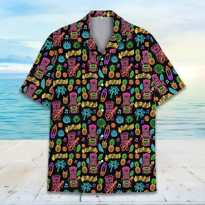 Group wearing matching family Hawaiian shirts with neon luau design