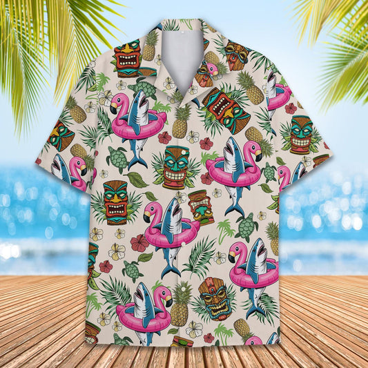 Main view of tropical hawaiian shirt featuring tiki masks and flamingo floats