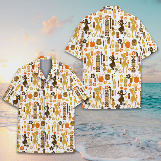 Main view of the white tropical hawaiian shirt featuring hula dancers, tiki masks, and palm trees in brown and orange