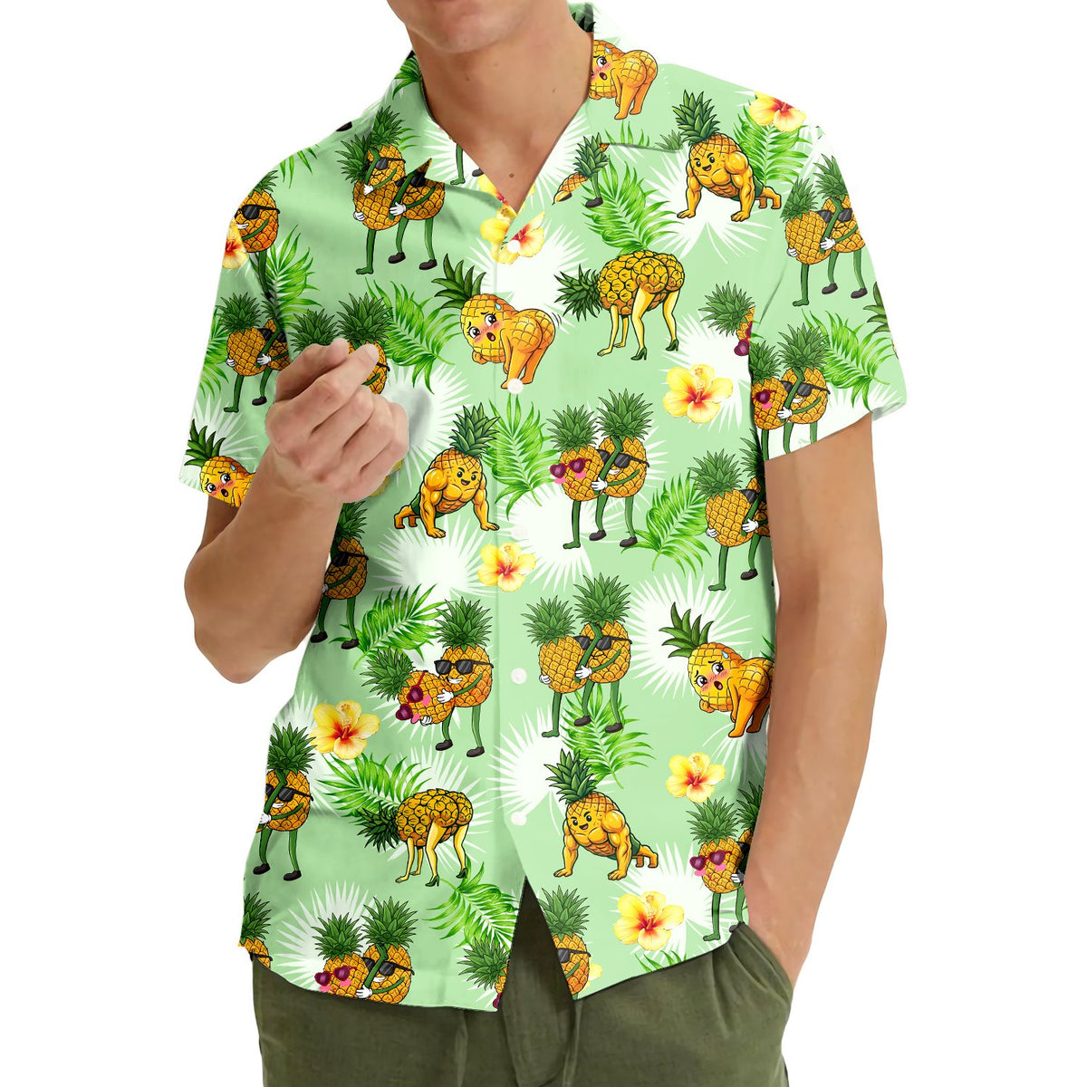 Another lifestyle shot featuring the light green tropical Hawaiian shirt outdoors