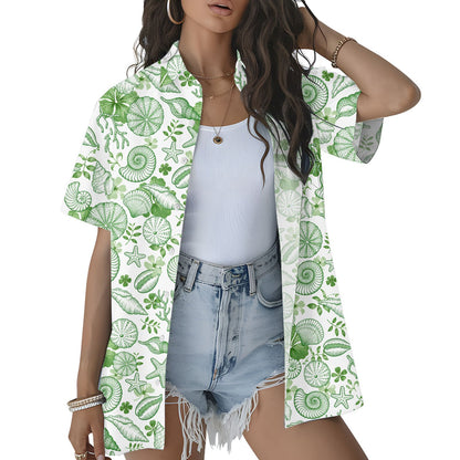 Family matching Hawaiian shirts outdoors white and green seashell design