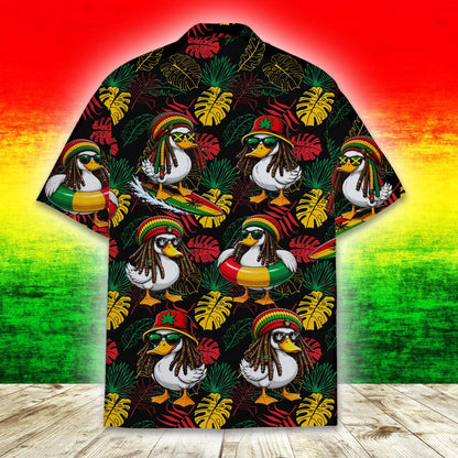 Close-up of the duck on a surfboard pattern on the black tropical hawaiian shirt.