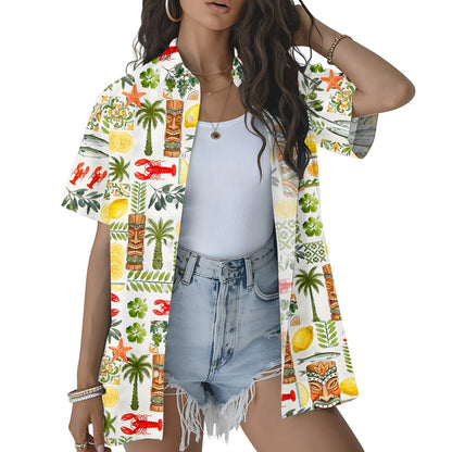 Close-up lifestyle shot of the tropical hawaiian shirt fabric and pattern