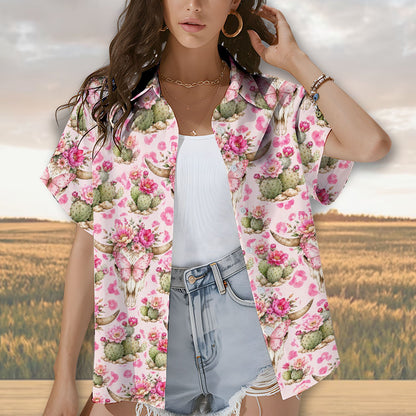 Family wearing matching pink western hawaiian shirts outdoors