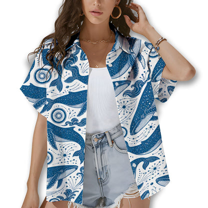 White whales hawaiian shirt with blue whale and wave illustrations, front view