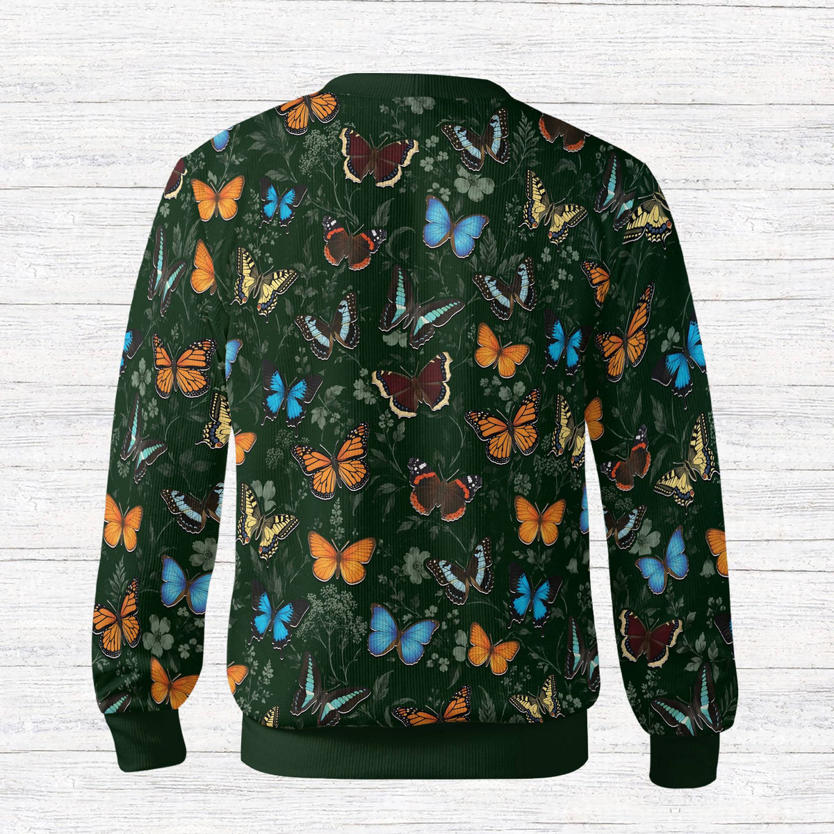Back view of the vibrant butterfly floral cardigan showing the all-over botanical print