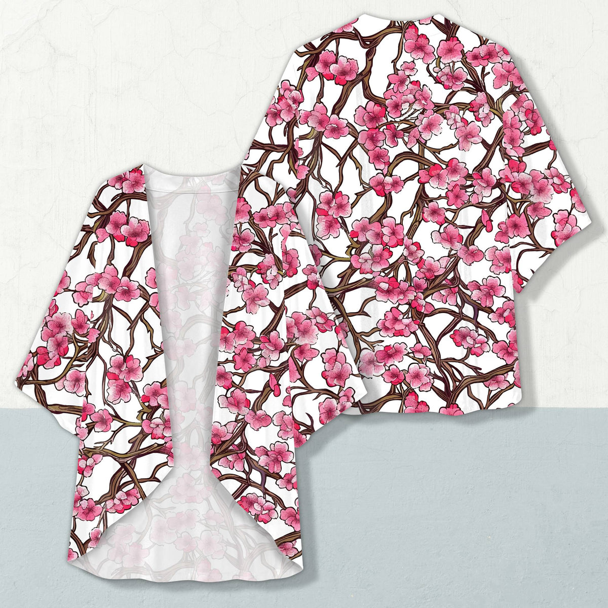 Cherry print cardigan displaying dense pink floral pattern, front view