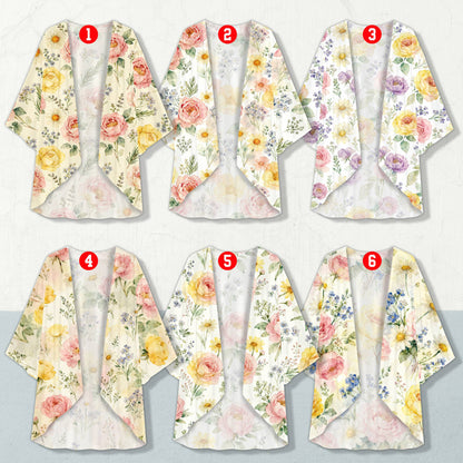 Ladies floral cardigan with watercolor blooms, front view on light background