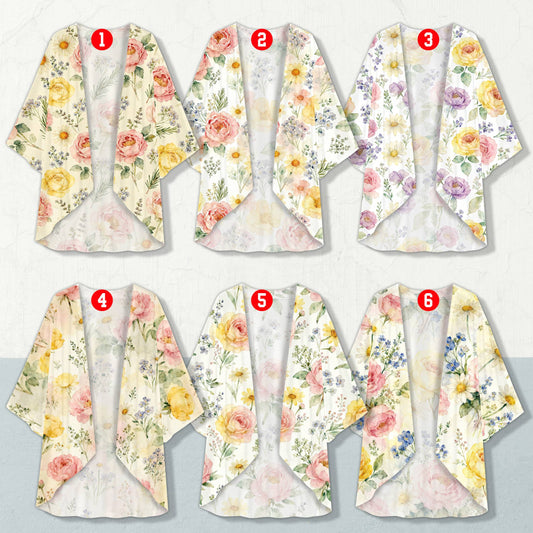 Ladies floral cardigan with watercolor blooms, front view on light background