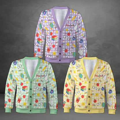 Front view of the multicolor plaid teacher cardigan on a hanger