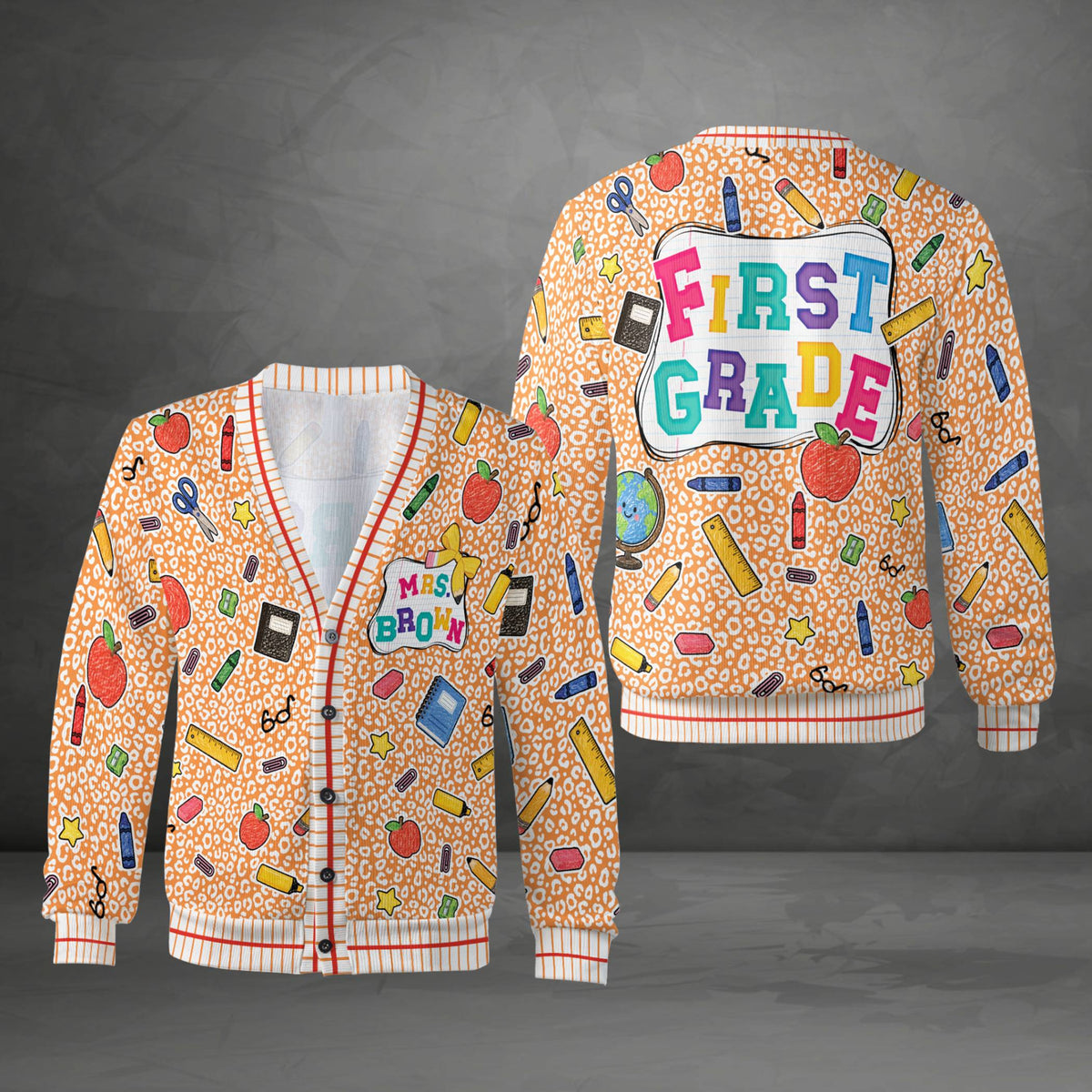 Orange custom teacher cardigan front view with name tag and school supply design