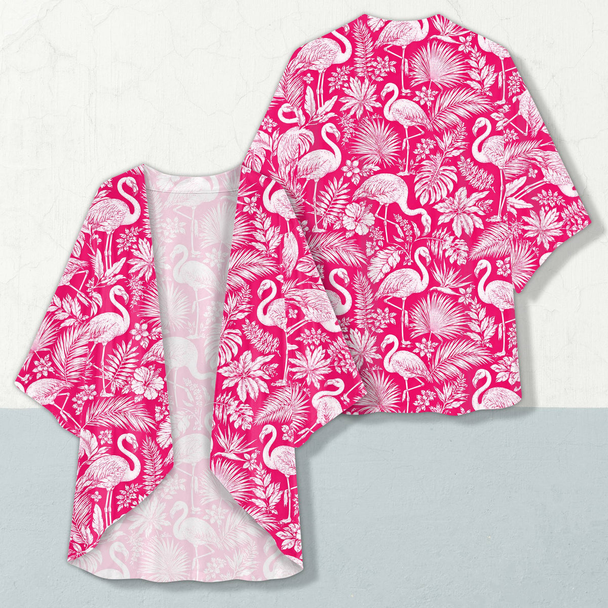 Front view of the pink tropical print cardigan with hibiscus and palm leaf design