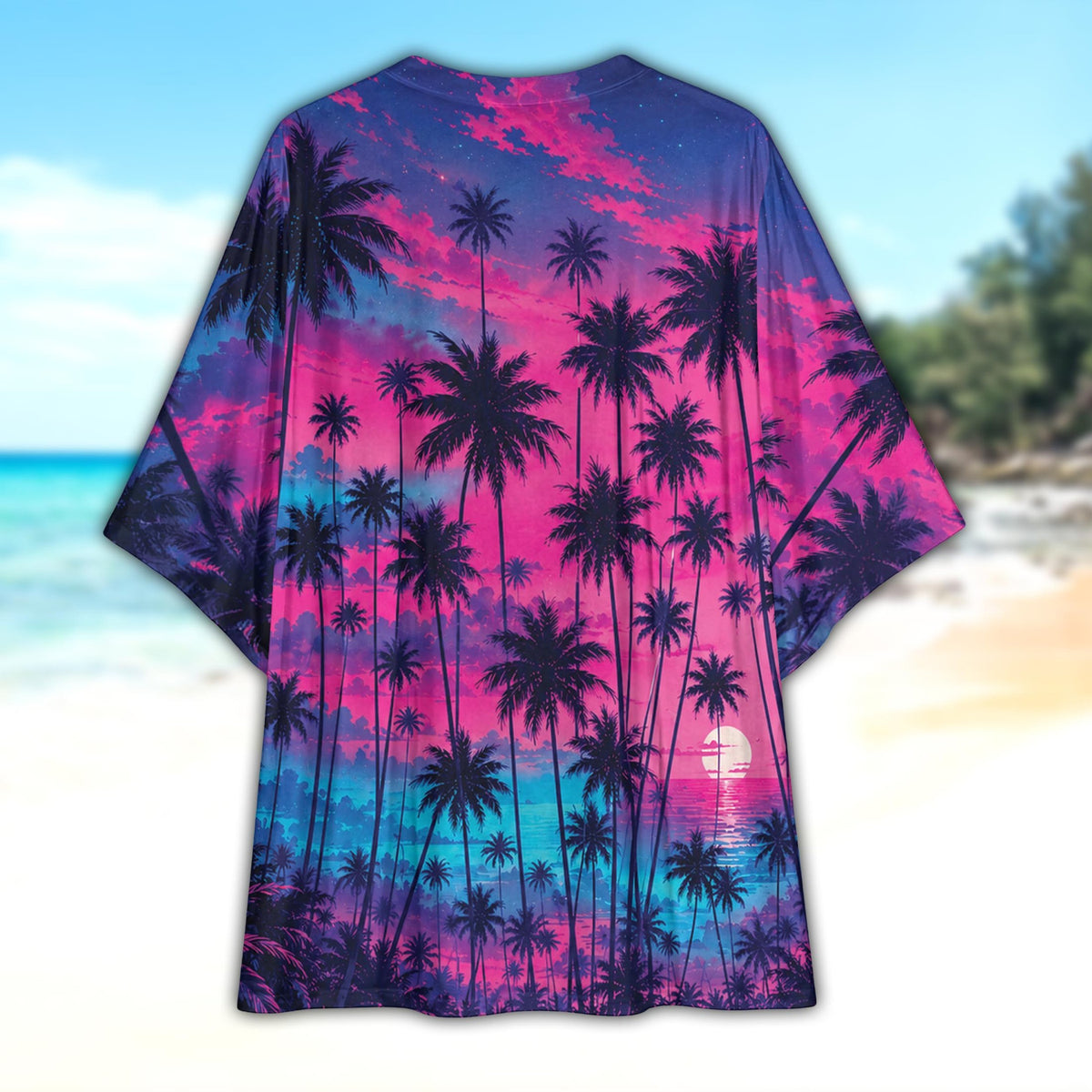 Back view of the tropical sunset cardigan displaying palm tree silhouettes and reflective ocean